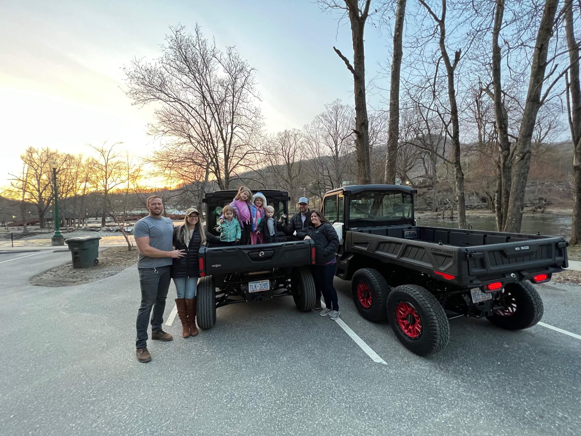 Family Picture by UTVs in Cherokee, NC on the river.