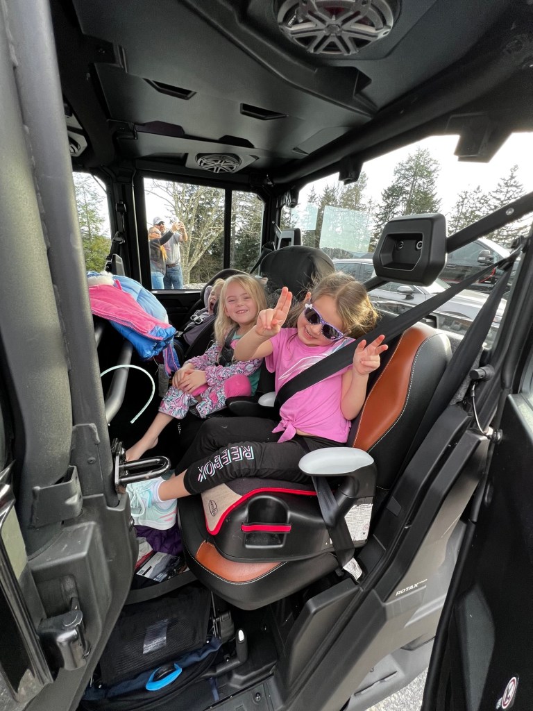 Family enjoying a ride on a UTV near Cheroke, NC