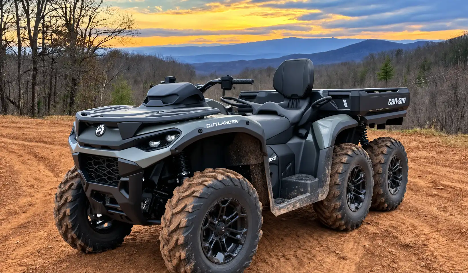 Can-Am Outlander MAX 6x6 ATV parked on a dirt trail at sunset