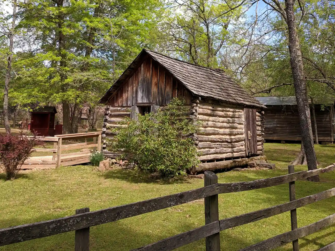 Historic log cabin at the Cherokee Heritage Center, an educational Gatlinburg stop