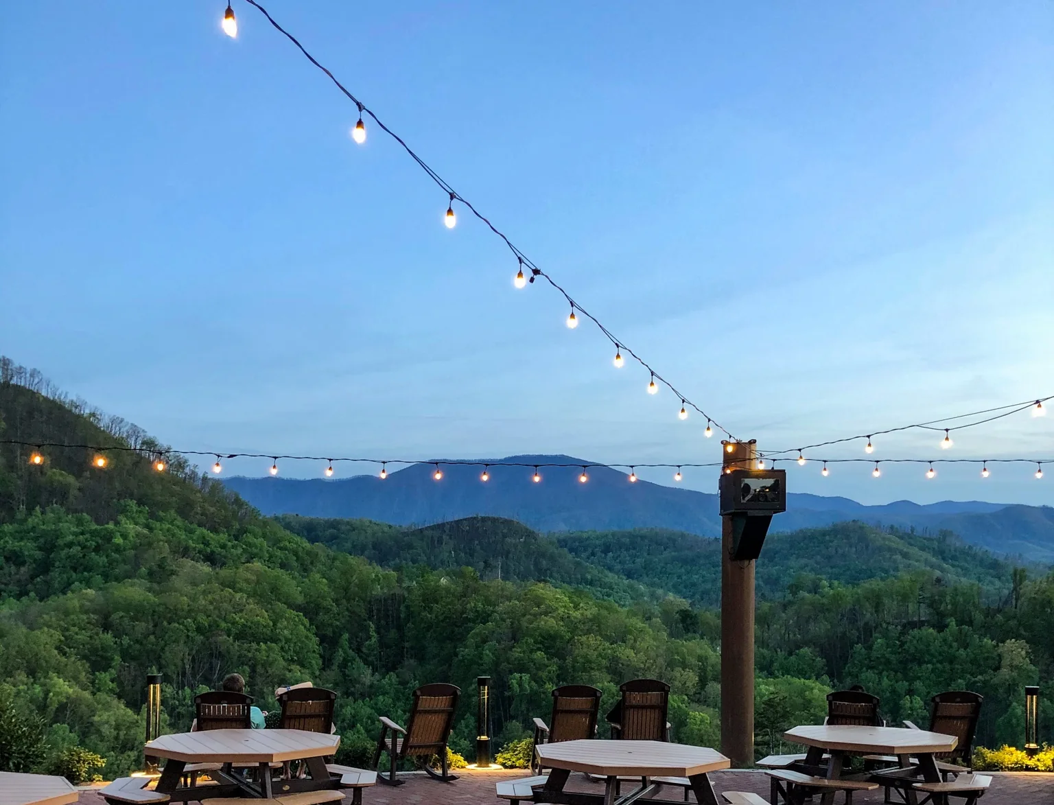 Mountain sunset view from an outdoor dining terrace near Gatlinburg